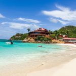 Eden Rock hotel perched on volcanic rock at St. Jean Beach, St. Barths, with crystal clear turquoise water